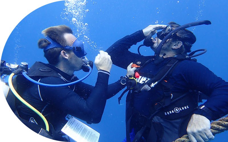 PADI instructor and scuba diver at Netrani